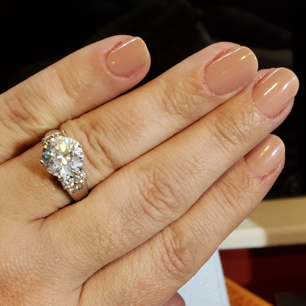 4.66TCW platinum over sterling silver setting
